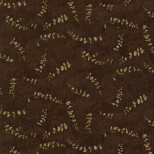 Brown fabric with a pattern of light yellow fern-like designs.