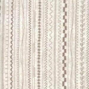 Beige and brown zigzag patterned fabric with vertical lines.