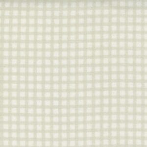 Textured beige and off-white grid pattern fabric.