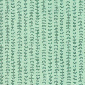 Green fabric with a repeating leaf pattern.