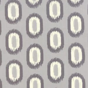 Abstract pattern with oval shapes in gray, beige, and white.