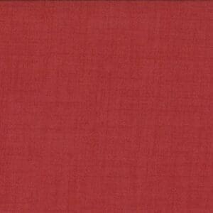 Textured red fabric with subtle weave pattern.