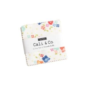 Stack of colorful floral fabric squares from Cali & Co.