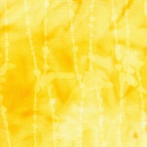 Bright yellow tie-dye pattern with white accents.