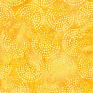 Yellow abstract pattern with dotted spiral shapes.