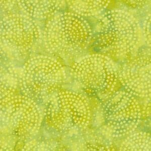 Green and yellow pattern with circular, leaf-like shapes.