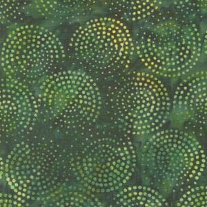 Green fabric with yellow dotted spiral patterns.