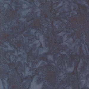 Close-up of a dark blue textured surface with irregular patterns.