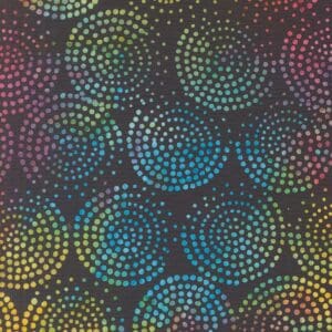 Colorful circular dot pattern on a dark background.