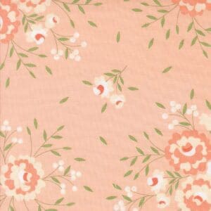 Soft peach background with delicate floral pattern in green and white.