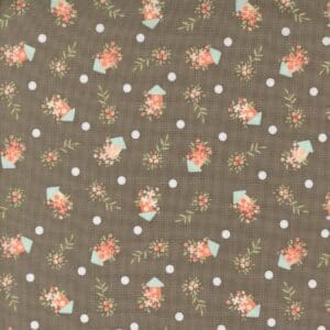 Vintage floral pattern with small pink and white flowers on a muted brown background.