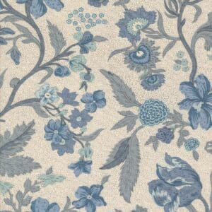 Textured beige fabric with blue floral patterns.