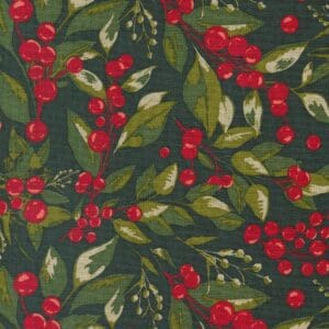Festive pattern of red berries and green leaves on a dark background.