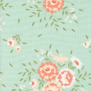 Pastel floral pattern with pink roses on a light blue background.