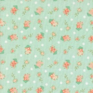 A mint green floral pattern with small pink and white flowers.