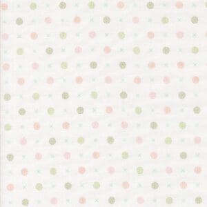 Soft pastel polka dot pattern on a light background.