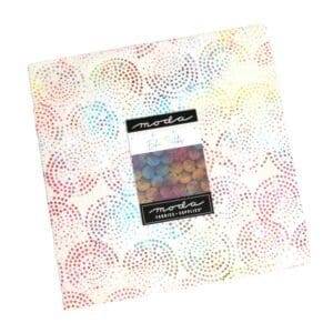 Colorful patterned paper sheet with a small label in the center.