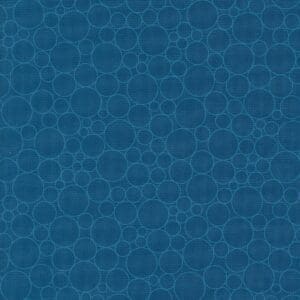 Blue textured surface with circular patterns.