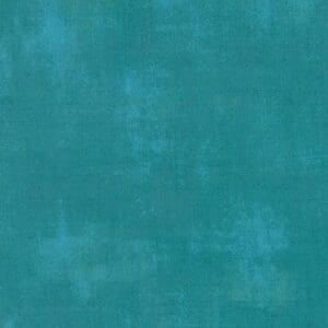 Textured teal background with a subtle grunge effect.