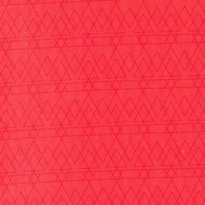 Red fabric with a subtle geometric triangle pattern.