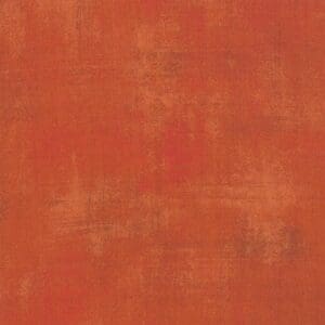 Abstract orange textured background with subtle variations.