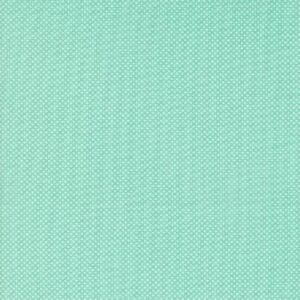 Light turquoise fabric with a subtle textured pattern.