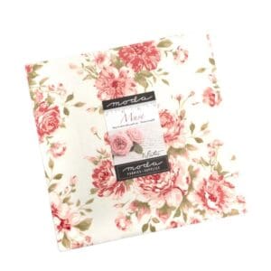 Floral-patterned fabric bundle with pink and red roses on a white background.