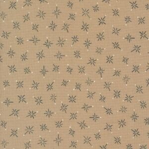 Brown paper with black star-like patterns scattered evenly.