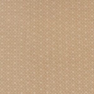 Beige textured fabric with a subtle geometric pattern.