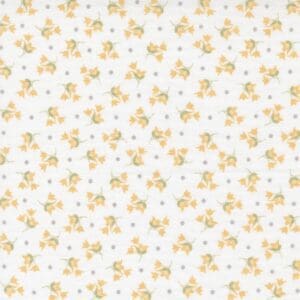 Delicate floral pattern with small yellow flowers on a white background.