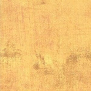 A textured, aged parchment or paper background in warm tones.