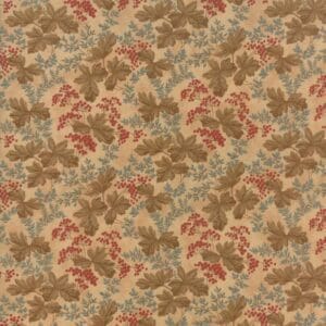 Vintage floral patterned fabric with muted red and green tones.