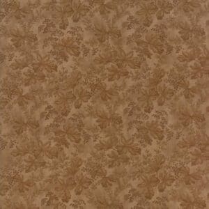 Brown textured surface with a subtle leafy pattern.
