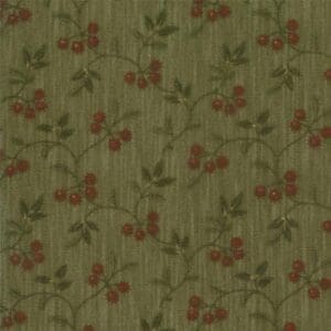 Green fabric with a delicate floral pattern.