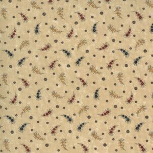 Close-up of a beige fabric with small, scattered abstract shapes in blue and brown.