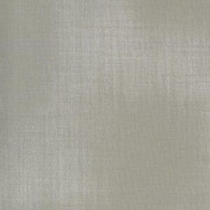 Close-up of a textured beige fabric surface.