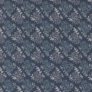 Blue fabric with a repeating white leaf pattern.