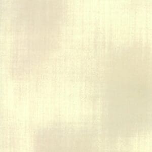 A beige, textured fabric background with subtle woven patterns.