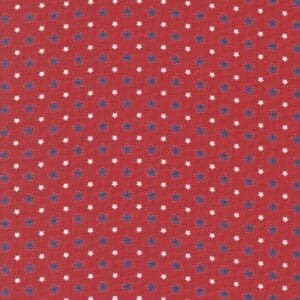 Red fabric with a pattern of small white and blue stars.