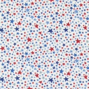 Pattern of red, blue, and light blue stars scattered on a white background.