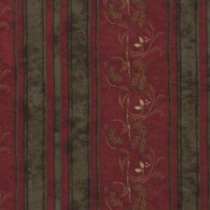 Red and green vertical striped floral patterned fabric.