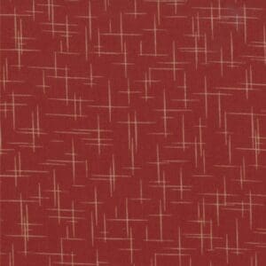 Textured red fabric with a subtle beige linear pattern.