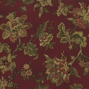 Intricate floral pattern on a rich burgundy fabric background.
