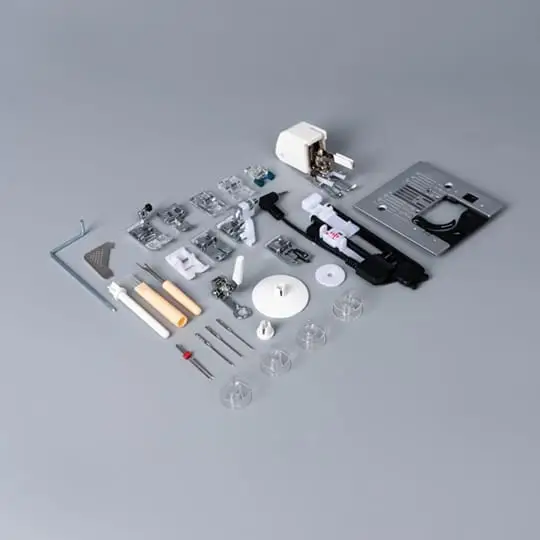 Sewing machine accessory kit with presser feet