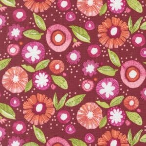 Colorful floral pattern with green leaves.