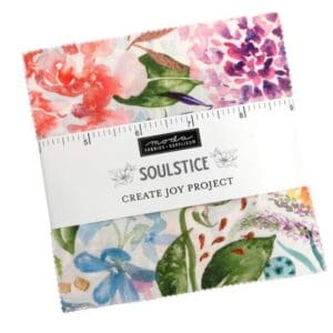 Fabric squares with colorful floral patterns.