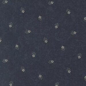 Dark fabric with small white floral pattern.