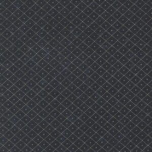 Dark fabric with small dotted diamond pattern.