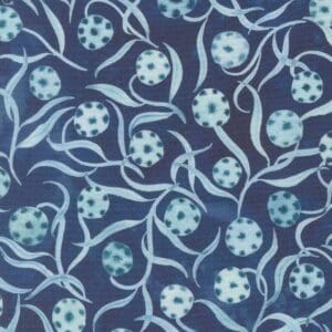 Blue fabric with abstract dot and leaf pattern.