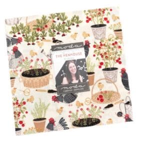 Fabric square with garden and henhouse design.
